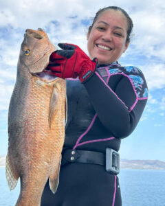 Only her second day spearfishing and diving and she scored a cubera!